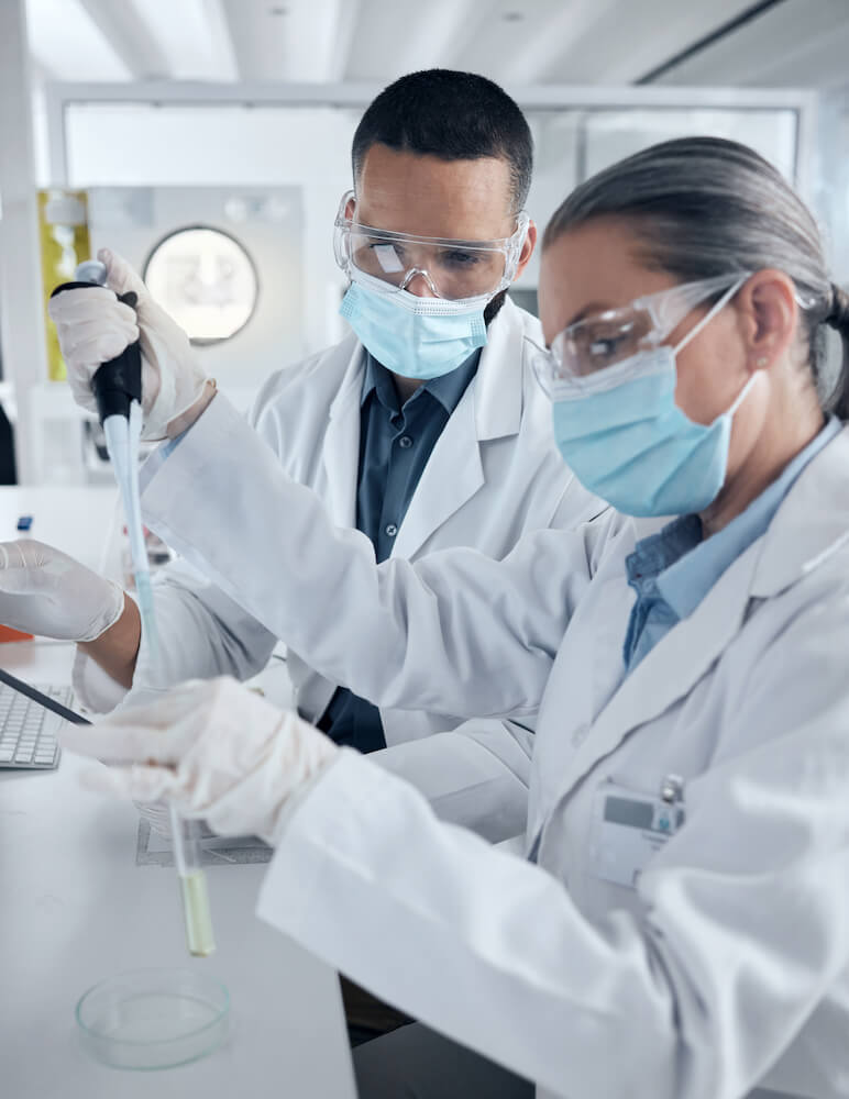 Scientists Working Together in Modern Laboratory